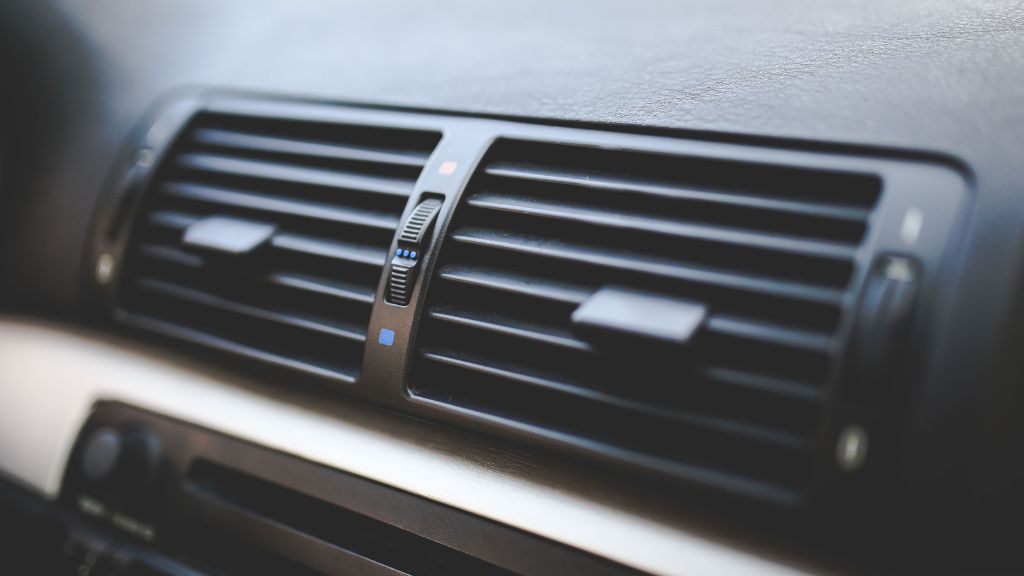 car AC warm air blowing reason fix India